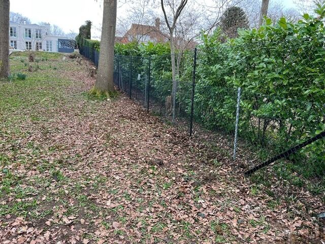 Chain-link fence on a hilly site in Cumnor